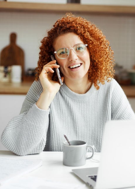 Customer Support Person Smiling On Phone