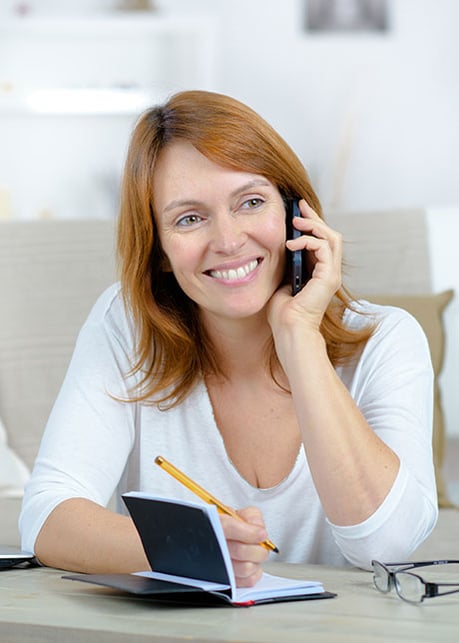 Customer Support Person Smiling On Phone