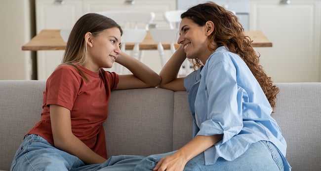 Parent talking with child about how the school year went