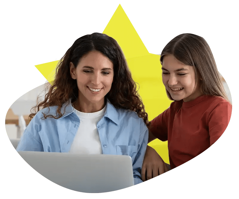 Williamsburg mother and daughter reading blog on laptop