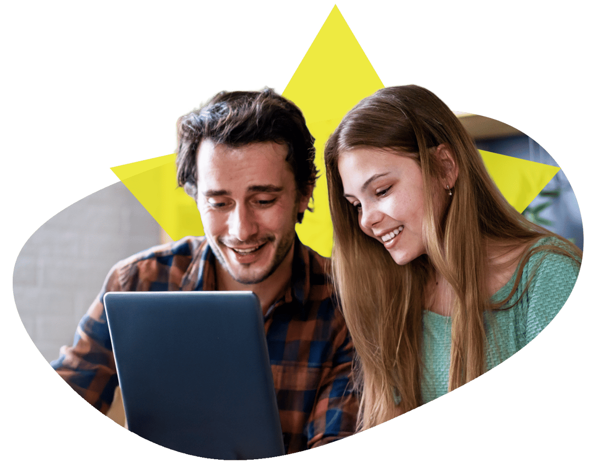 Family looking at laptop