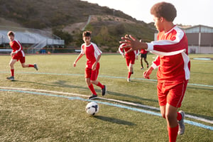 photo of Williamsburg teens playing soccer