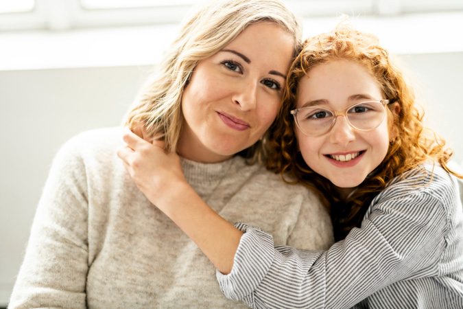 Mother and Daughter Hugging
