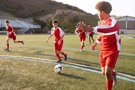 students playing soccer
